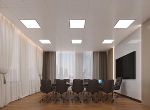 Sales-led B2B team meeting around laptops