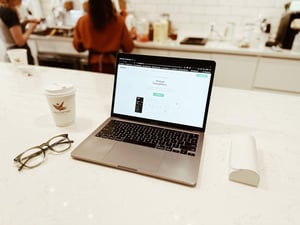 Team evaluating HubSpot implementation options in a modern office